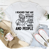 I Reached That Age Where I Am Bothered by Lights On, Open Doors, Loud Noises, and People T-Shirt