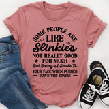Some People Are Like Slinkies Not Really Good for Much but Bring a Smile to Your Face When Pushed Down the Stairs T-Shirt